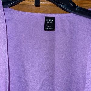 Kimano with flower print and a belt.